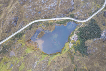 A marble like lagoon in Ecuador next to a long road