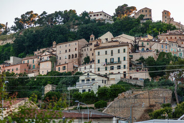 Fototapeta na wymiar San Benedetto Del Tronto, Marche, Italy - June 5, 2015 - Beachfront Homes Shops & Buildings On A Cliff 