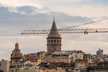 Obraz premium Galata tower and construction crane