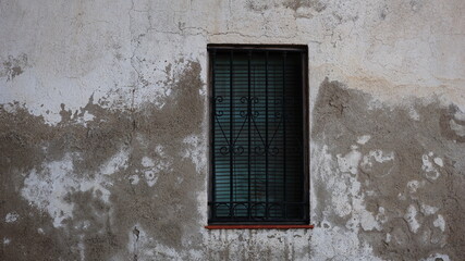 rustic window in old facade