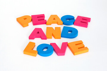 Word made up of multicolored letters. Peace and love