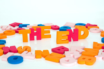 Word made up of multicolored letters. The end