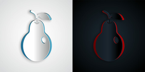 Paper cut Pear icon isolated on grey and black background. Fruit with leaf symbol. Paper art style. Vector
