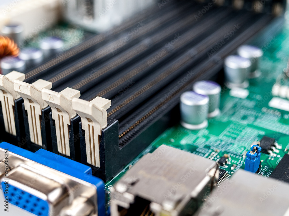 Poster slots, dimm ddr connectors, connecting devices of ram modules in the computer motherboard, close-up 