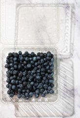 blueberries in a glass bowl