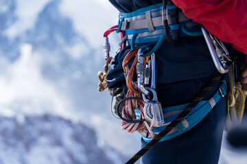 Man with climbing equipment.