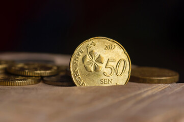 Close up of 50 sen Ringgit Malaysia, selected focus © JakaSuryanta