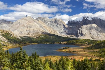 Scenic Landscape View of Beautiful Baker Lake on a Fall Hike in Skoki Area of Banff National Park with Rugged Canadian Rocky Mountain Peaks on Skyline