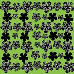 Black seamles floral pattern on a beautiful green background with a spring theme