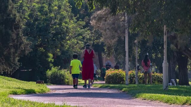 Valencia Spain Turia running park timelapse, resort sity, activities and fitness, family with childrens 4K