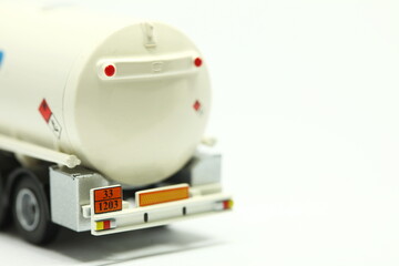 Hazard identification number behind miniature plactic truck model represent European safety...