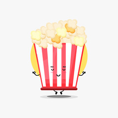 Cute popcorn character meditating in yoga pose
