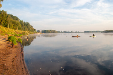 Sunrise ofer fishers on the river fishing