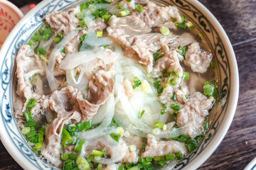 Vietnamese style rice noodles with a lot of beef.