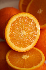 Fresh oranges stack on top of each other
