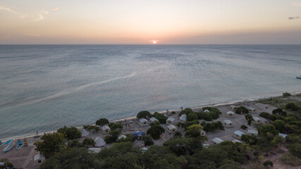 sunset beach with glamping