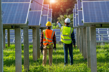 Engineer or electrician working on replacement solar panel at solar power plant,Concept solar power...