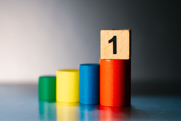 Wooden block number one on stage using as business competition concept