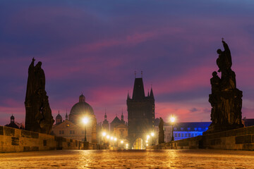 Morning twilight over the Charles Bridge in the center of the Czech city of Prague