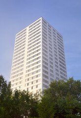 Multi-storey house against the sky in the morning fog