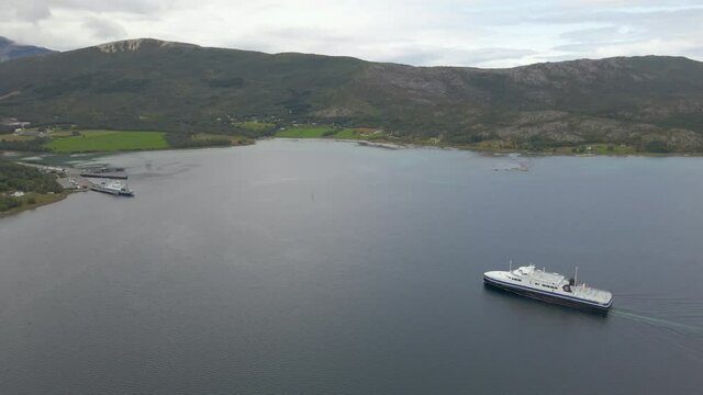 Large Ferry Boat Transporting Passengers From Bognes to Lodingen Norway - aerial shot
