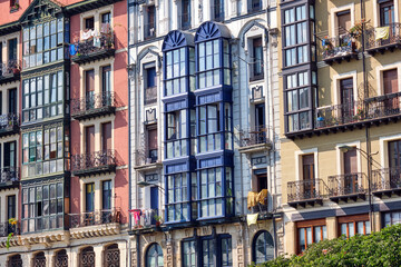Fototapeta na wymiar Some typical house facades of the old town of Bilbao in Spain