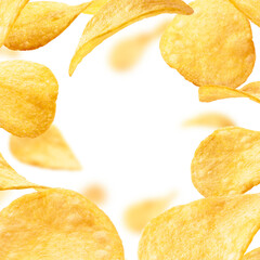 Potato chips levitate on a white background