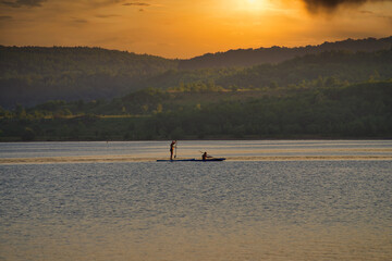 Obraz na płótnie Canvas fishing at sunset