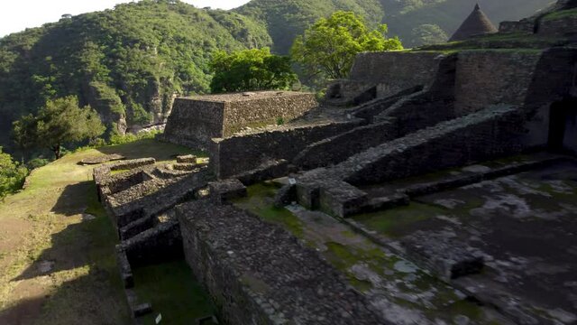 Ruins in the jungle. The house of the eagles was a retreat for the elite Aztec warriors. Stunning low flyby into parallax cinematic motion. Aztec Pyramid. 
