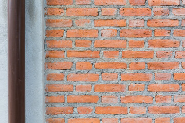 An old orange brick wall using for a background. 