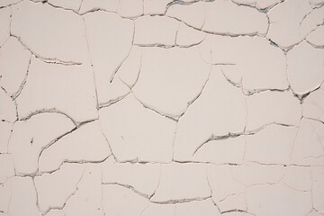 Overlay for your design. Background texture of a white cement wall with a crack. A crack in the old wall. High quality photo