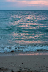 small waves portrait photo on the beach