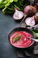 Seasonal fall autumn creamy beetroot soup on a table
