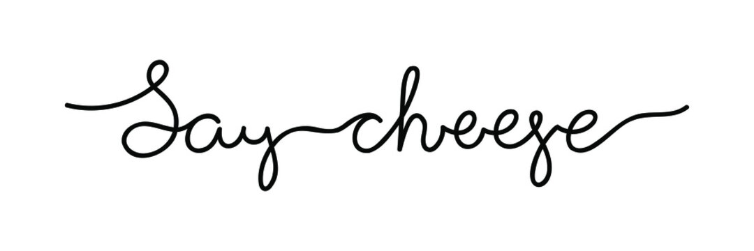 Say cheese - trendy one line freehand cursive text. Black vector isolated on white background.