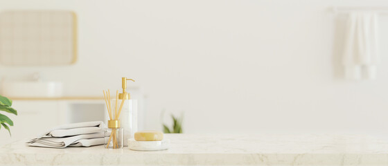 Marble tabletop with bathing accessories for display montage over blurred white bathroom