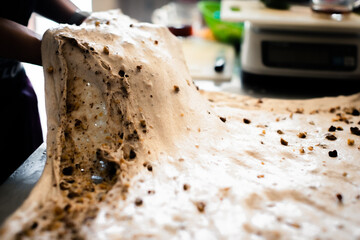 Making bread with cheese and nuts in the bakery