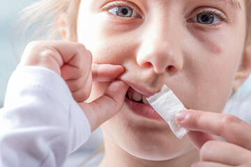 snus. tobacco in bags. a female child uses nicotine. close-up. - obrazy, fototapety, plakaty