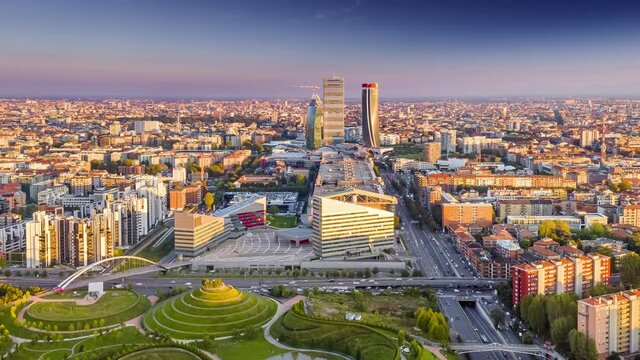 Milan Hyperlapse Time lapse sunset. Aerial Drone Flight Timelapse Of Panoramic Skyline Milano Of Metropolitan City. Drone lapse 4k