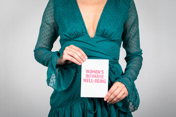 Fototapeta na wymiar Women's intimate well-being. Woman in green dress
