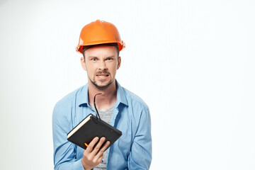 man in orange helmet protection Working profession