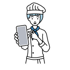 立ってスマートフォンを指差してこちらに向けて見せている調理師の女性
