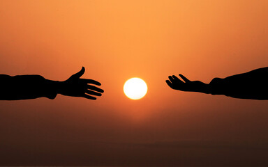 Human hand Asking help Concept. hands helping each other Against Sunset background. People helping, God salvation and Get Hired Concepts