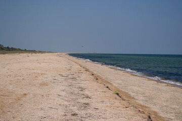 Fototapeta na wymiar Seascape. The beach on the Arabatskaya strelka of the Sea of Azov. 