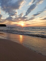 sunset reflection on wet sand