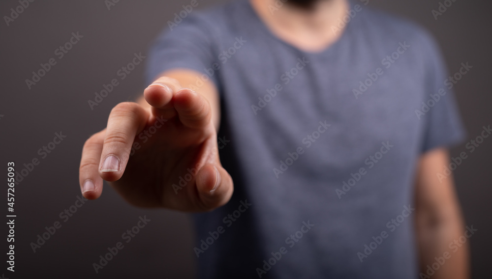 Poster Businessman pointing or touching finger in screen..