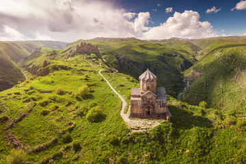 Stunning view and panorama of famous Amberd fortress and Vahramashen Church in Armenia. It sits on the cliff with Arkashian River deep in the canyon