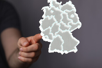 a virtual germany land map digital in hand 3d.