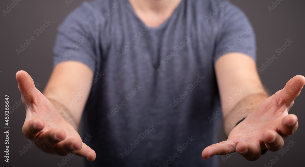 Poster man showing his empty hand.