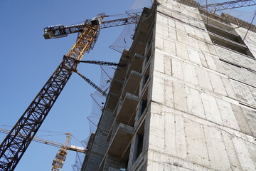 Fototapeta premium Almaty, Kazakhstan - 09.09.2021 : Construction of a high-rise residential building