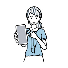 立ってスマートフォンを指差してこちらに向けて見せているオフィスカジュアルの女性